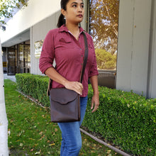 Load image into Gallery viewer, Rollins Road Brown Leather Crossbody Bag worn by beautiful asian model