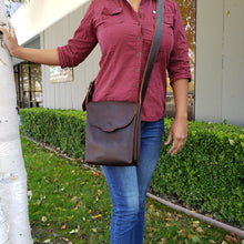 Load image into Gallery viewer, Rollins Road Brown Leather Crossbody Bag worn by beautiful model
